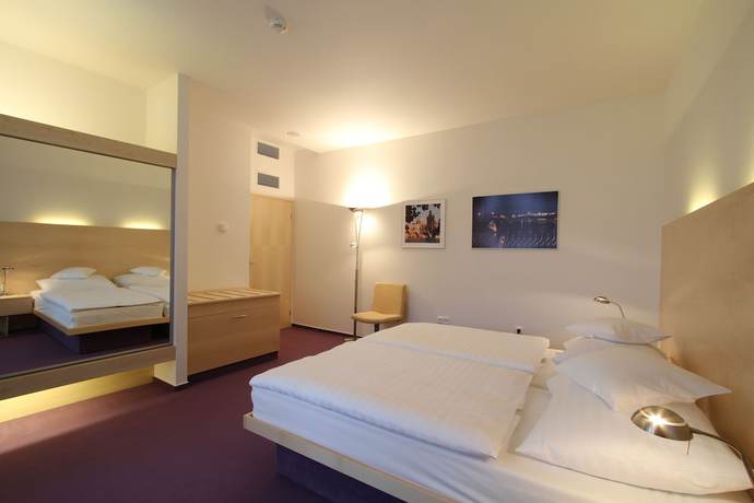 Imagen de la habitación del Hotel DAP, Praga. Foto 13