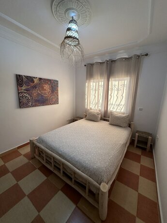 Imagen de la habitación del Hotel DAR SANAE SURF. Foto 17