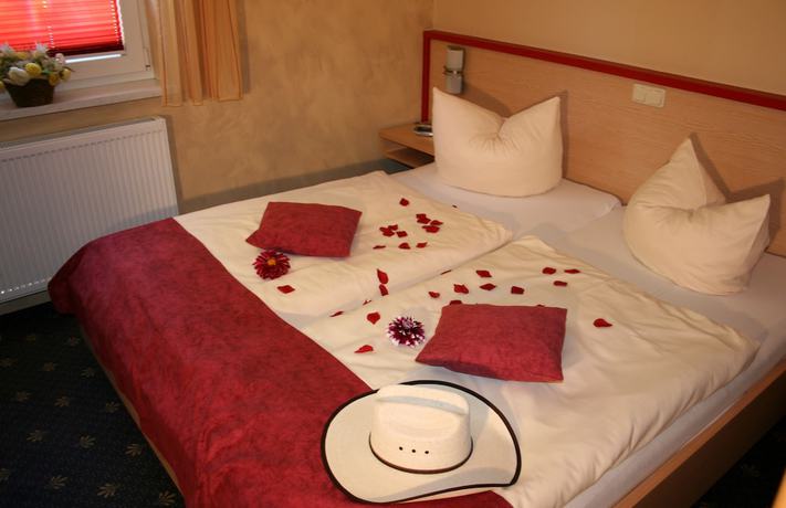 Imagen de la habitación del Hotel DAS HUDEWALD and Resort. Foto 6