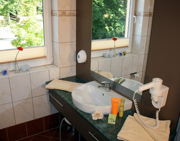Imagen de la habitación del Hotel DAS HUDEWALD and Resort. Foto 11