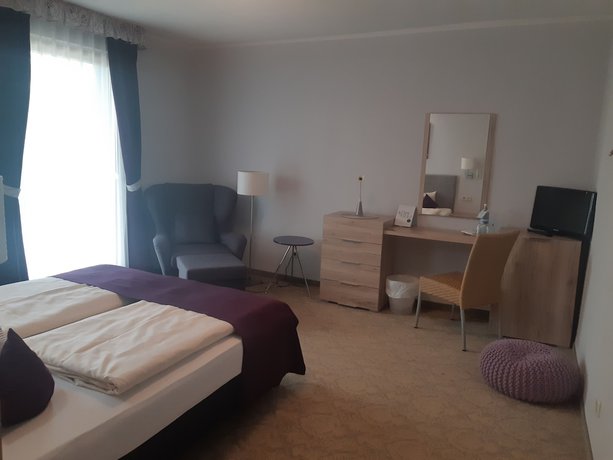 Imagen de la habitación del Hotel DAS HUDEWALD and Resort. Foto 19