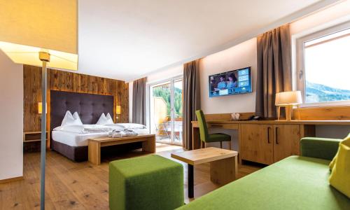 Imagen de la habitación del Hotel DAS ROYAL in Obereggen. Foto 15