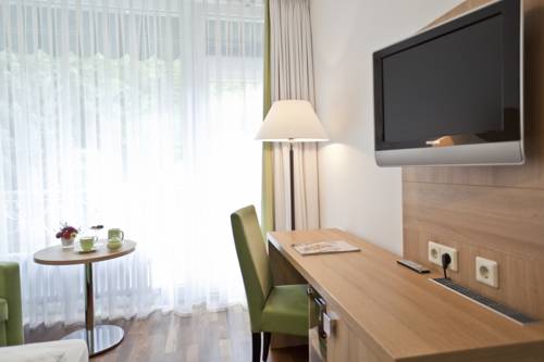 Imagen de la habitación del Hotel DAS SCHLOSSBERG - Boutique im Park- Nahe der Therme. Foto 11