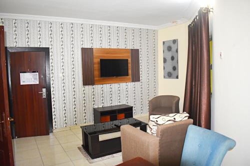 Imagen de la habitación del Hotel DAVIS HOTEL AND SUITES. Foto 19