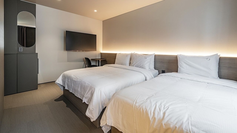 Imagen de la habitación del Hotel DAYONESTAY. Foto 2