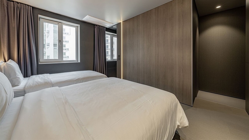 Imagen de la habitación del Hotel DAYONESTAY. Foto 3