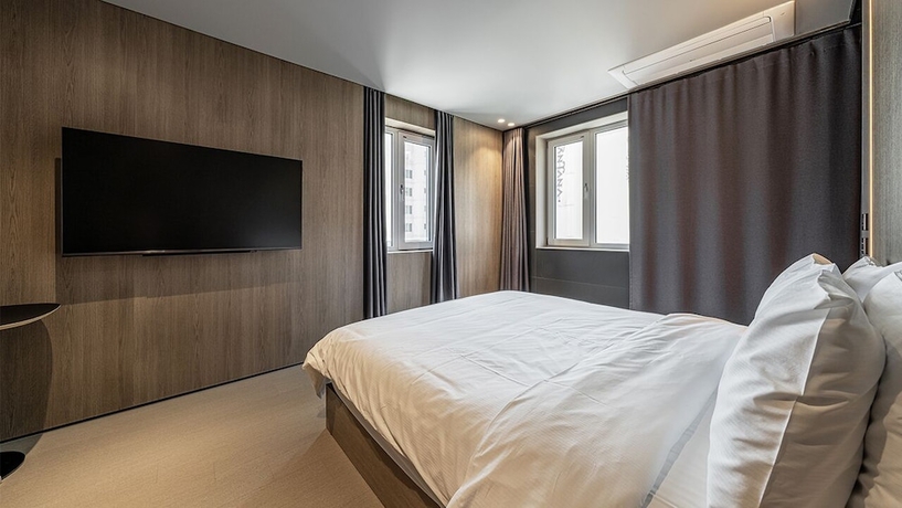 Imagen de la habitación del Hotel DAYONESTAY. Foto 5