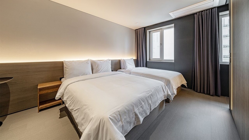 Imagen de la habitación del Hotel DAYONESTAY. Foto 8