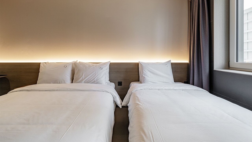 Imagen de la habitación del Hotel DAYONESTAY. Foto 9