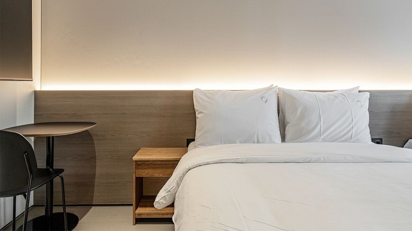 Imagen de la habitación del Hotel DAYONESTAY. Foto 11