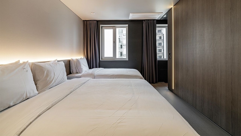 Imagen de la habitación del Hotel DAYONESTAY. Foto 12