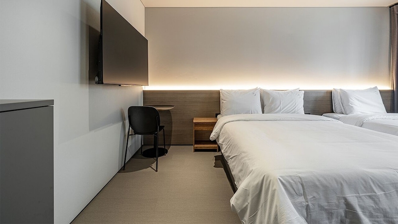 Imagen de la habitación del Hotel DAYONESTAY. Foto 14