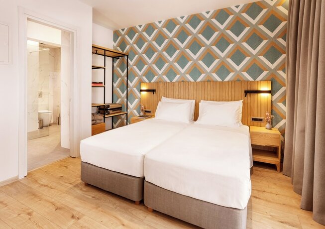 Imagen de la habitación del Hotel DAYS City Suites Athens. Foto 20