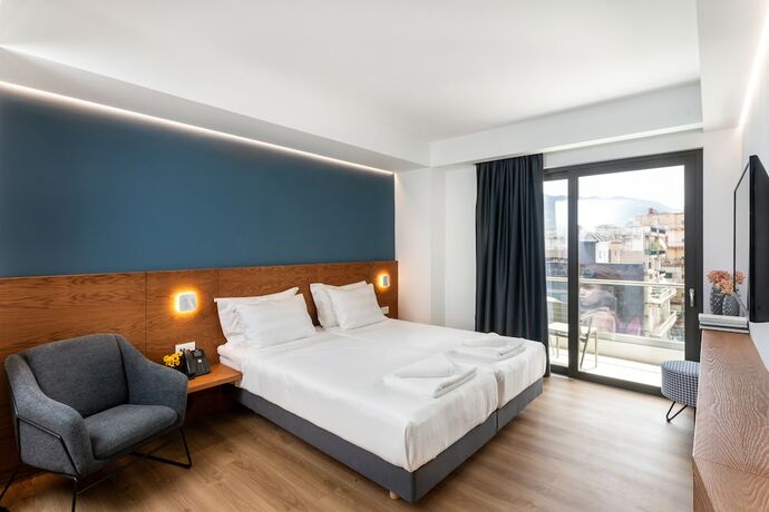 Imagen de la habitación del Hotel DAYS City Suites. Foto 15