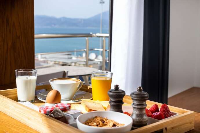 Imagen de la habitación del Hotel DAYS City Suites. Foto 16