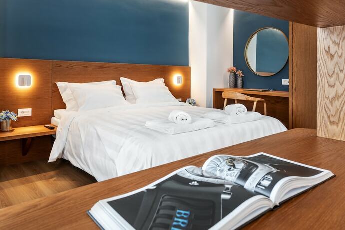 Imagen de la habitación del Hotel DAYS City Suites. Foto 18