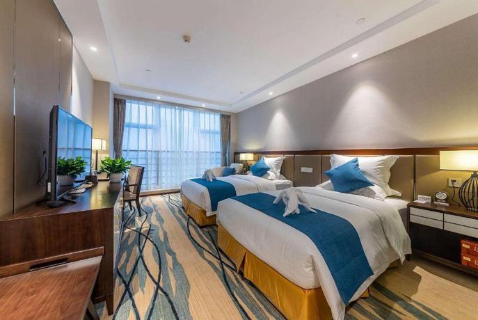Imagen de la habitación del Hotel DAYS HOTEL BY WYNDHAM CHONGQING KEYUAN. Foto 8