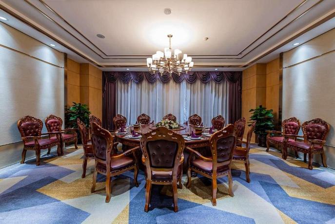 Imagen del bar/restaurante del Hotel DAYS HOTEL BY WYNDHAM CHONGQING KEYUAN. Foto 2