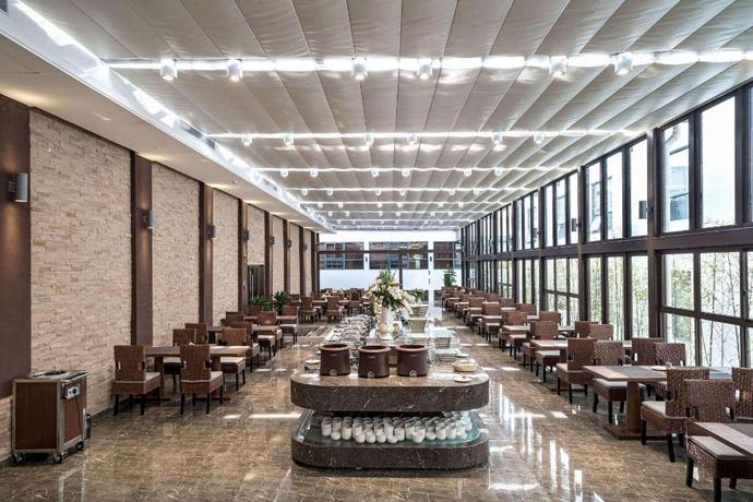 Imagen del bar/restaurante del Hotel DAYS HOTEL BY WYNDHAM YINXIANG WUYISHAN. Foto 6