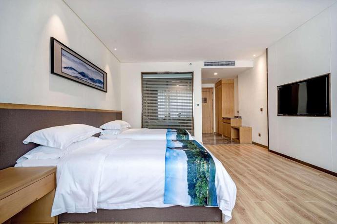 Imagen de la habitación del Hotel DAYS HOTEL BY WYNDHAM YINXIANG WUYISHAN. Foto 13