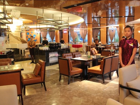 Imagen del bar/restaurante del Hotel DAYS HOTEL FUJIAN PUTIAN WEALTH POUSADA. Foto 1