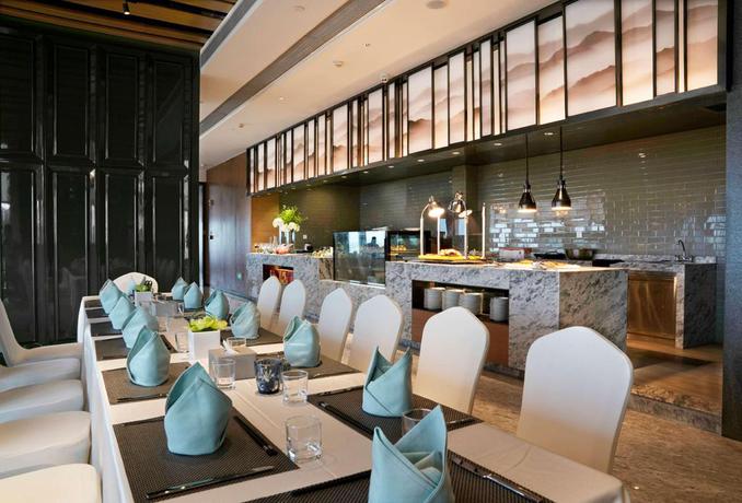 Imagen del bar/restaurante del Hotel DAYS HOTEL SUITES BY WYNDHAM ZIXIN CHANGSHA. Foto 3