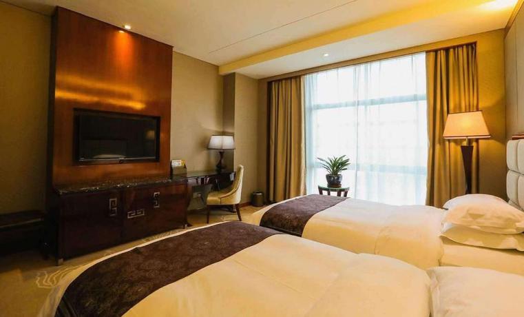 Imagen de la habitación del Hotel DAYS INN BY WYNDHAM YINIAN HENGYANG. Foto 5