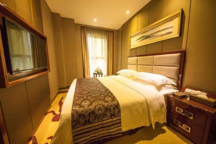 Imagen de la habitación del Hotel DAYS INN BY WYNDHAM YINIAN HENGYANG. Foto 7