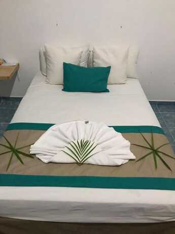 Imagen de la habitación del Hotel D\'Atyi. Foto 14