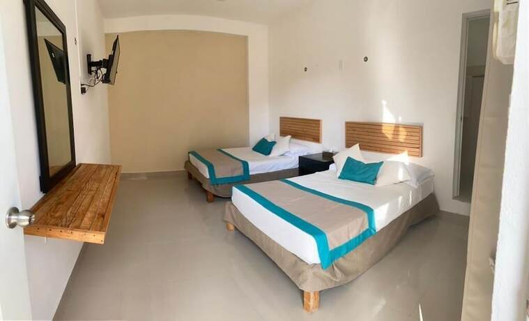 Imagen de la habitación del Hotel D\'Atyi. Foto 17