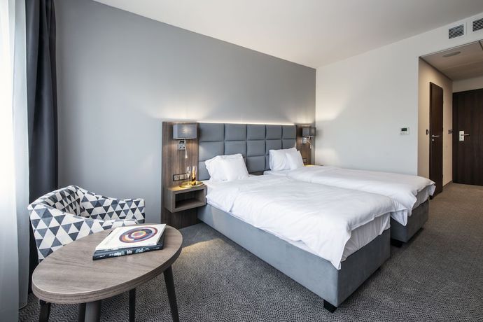Imagen de la habitación del Hotel DB Hotel Wrocław. Foto 5