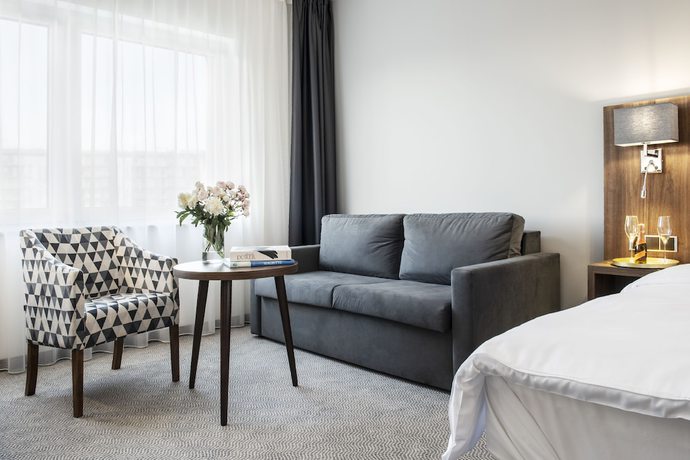 Imagen de la habitación del Hotel DB Hotel Wrocław. Foto 9