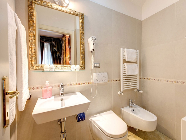 Imagen de la habitación del Hotel DCBoutique. Foto 8