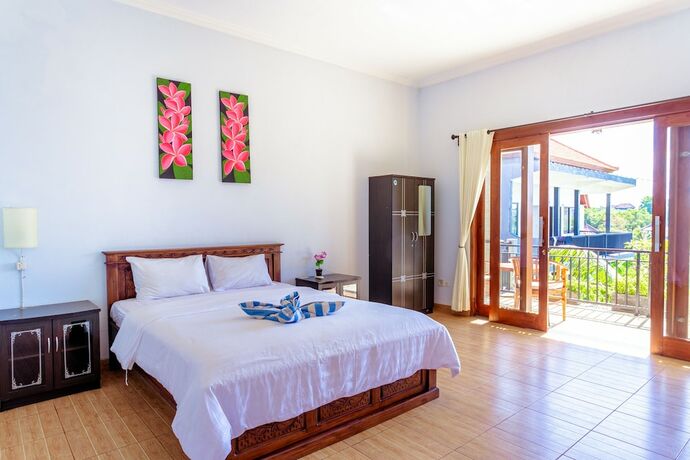 Imagen de la habitación del Hotel D\'Canggu Homestay. Foto 15