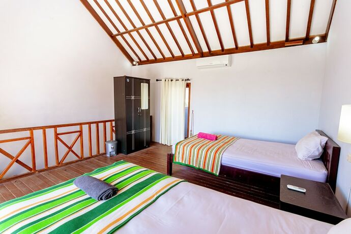 Imagen de la habitación del Hotel D\'Canggu Homestay. Foto 16