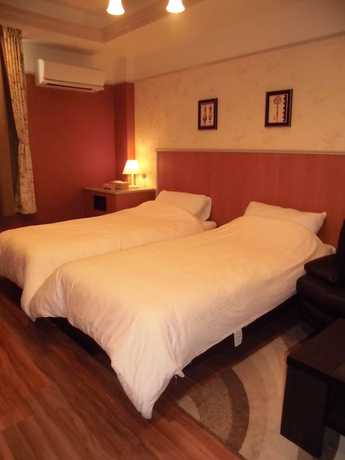 Imagen de la habitación del Hotel D.D Kashiba. Foto 8