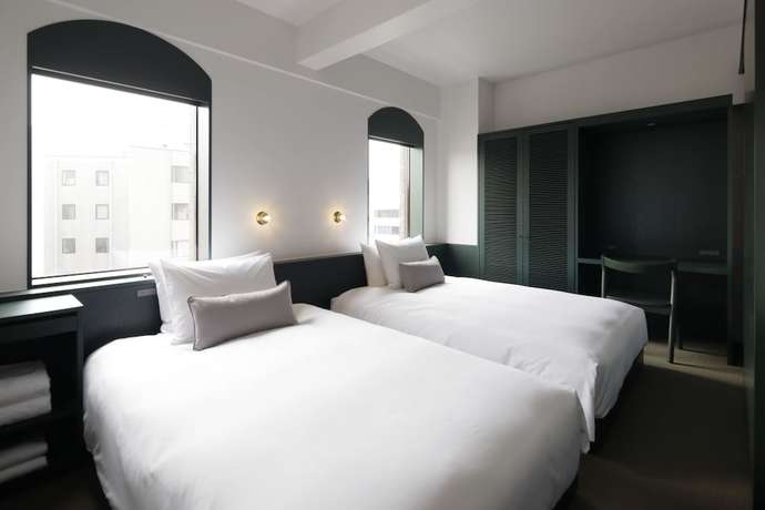 Imagen de la habitación del Hotel DDD HOTEL. Foto 13