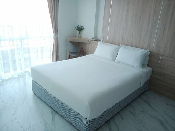 Imagen de la habitación del Hotel D-ECO Luxury Center Pattaya. Foto 13