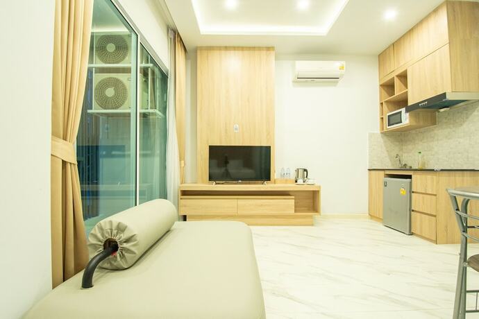 Imagen de la habitación del Hotel D-ECO Luxury Center Pattaya. Foto 14