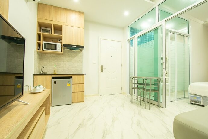 Imagen de la habitación del Hotel D-ECO Luxury Center Pattaya. Foto 17