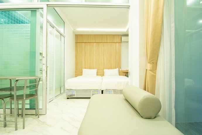 Imagen de la habitación del Hotel D-ECO Luxury Center Pattaya. Foto 18