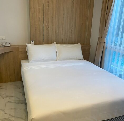 Imagen de la habitación del Hotel D-ECO Luxury Center Pattaya. Foto 19