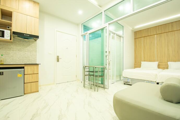 Imagen de la habitación del Hotel D-ECO Luxury Center Pattaya. Foto 20