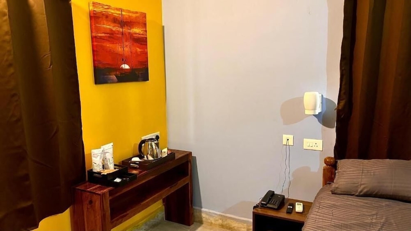 Imagen de la habitación del Hotel DEE DASH INN. Foto 8