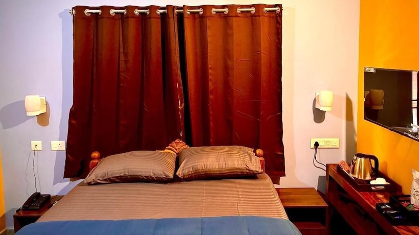 Imagen de la habitación del Hotel DEE DASH INN. Foto 9