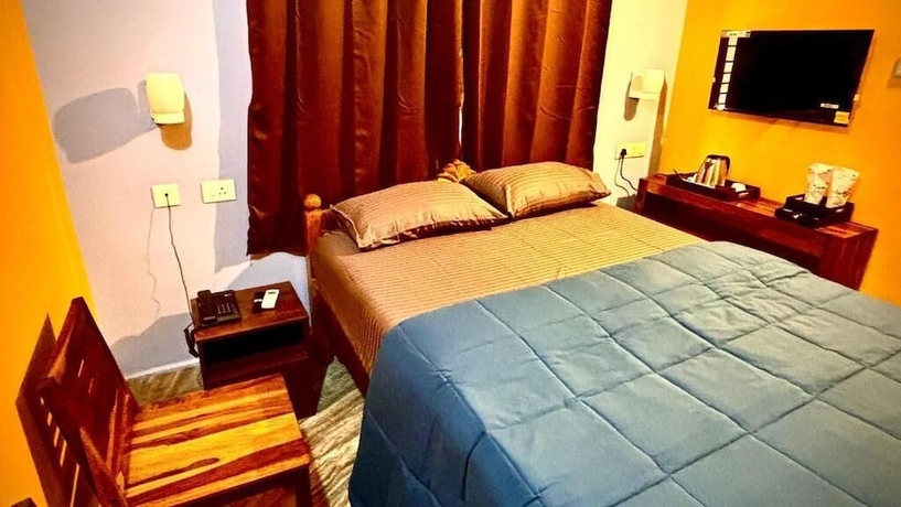 Imagen de la habitación del Hotel DEE DASH INN. Foto 13