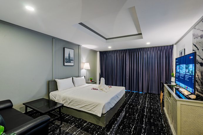 Imagen de la habitación del Hotel DEL MAX resort Pattaya. Foto 14