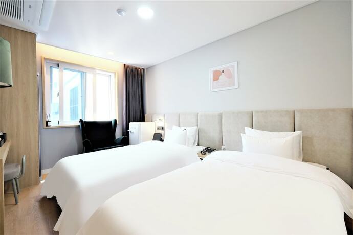 Imagen de la habitación del Hotel DELAMOUR. Foto 11