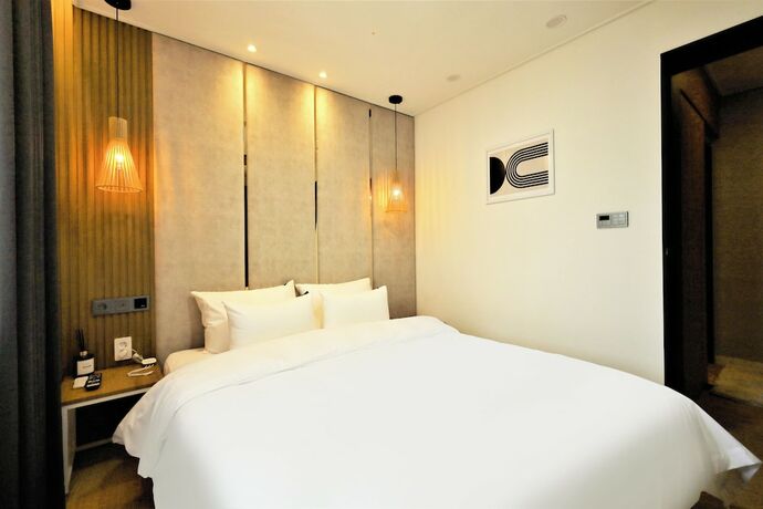 Imagen de la habitación del Hotel DELAMOUR. Foto 14
