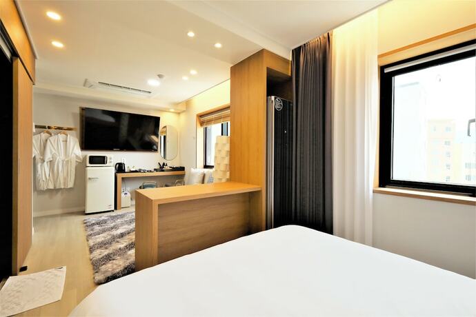Imagen de la habitación del Hotel DELAMOUR. Foto 19